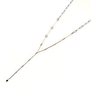 Long gold and black necklace